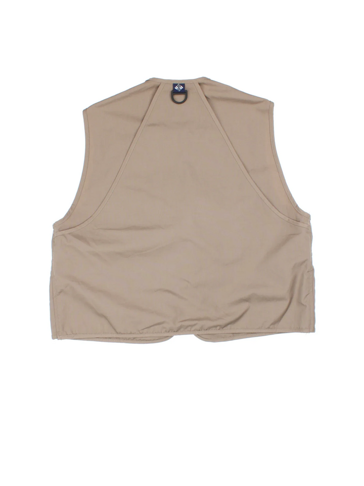 Vintage Columbia Fishing Vest in a tan colourway. Half zip up closure with multiple utility pockets, and has the logo embroidered on the front.