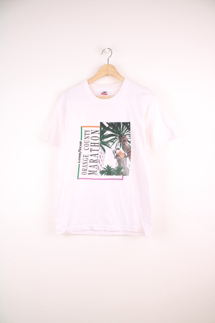 1991 white Fruit of the Loom tee with front graphic reading 'Goodyear Orange County Marathon' and back graphic reading 'November 3, 1991' and featuring brand sponsor logos. 