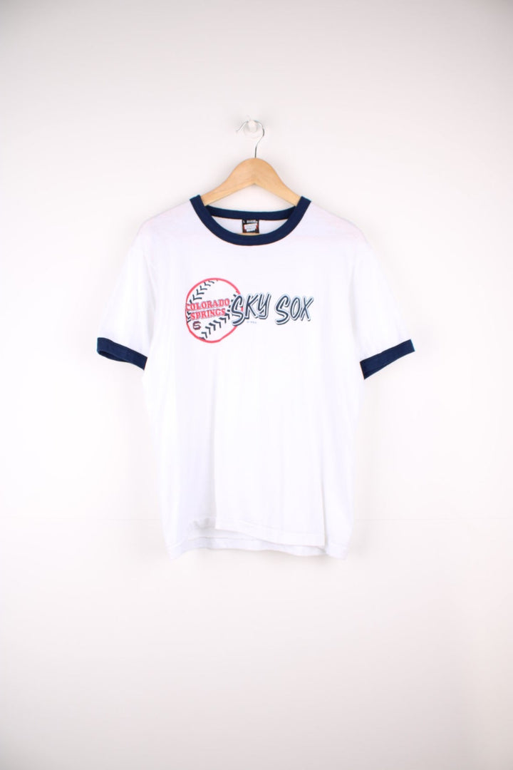 Made in the USA Vintage 90's Colorado Springs Sky Sox white and blue ringer tee. Features printed spell-out graphic across the chest