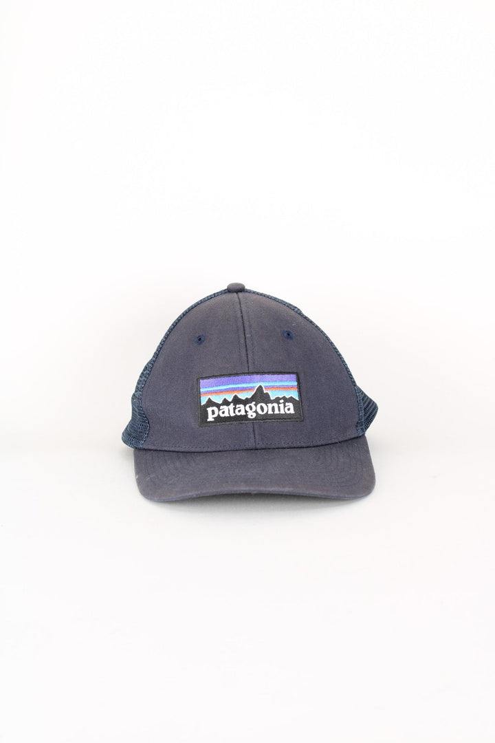 Patagonia Trucker Cap in a blue colourway with the logo embroidered on the front, mesh back, and has adjustable snapback.