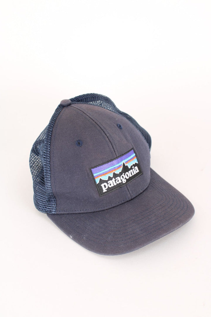 Patagonia Trucker Cap in a blue colourway with the logo embroidered on the front, mesh back, and has adjustable snapback.