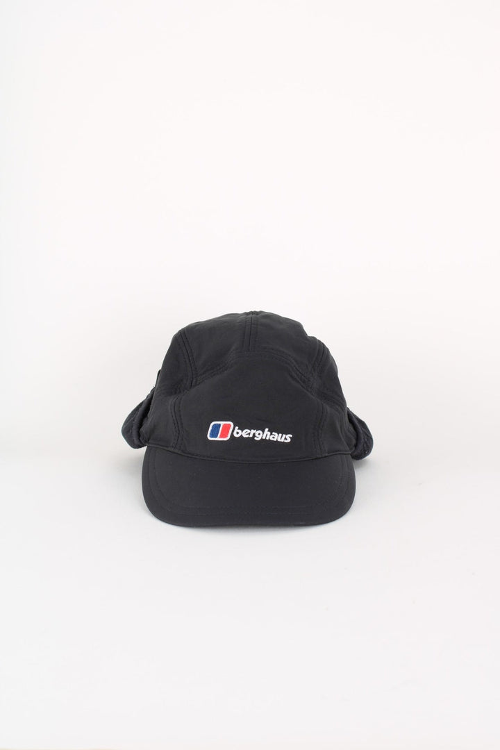 Berghaus Windstopper Cap in a black colourway with the logo embroidered on the front, and windstopper panel on the sides and back.