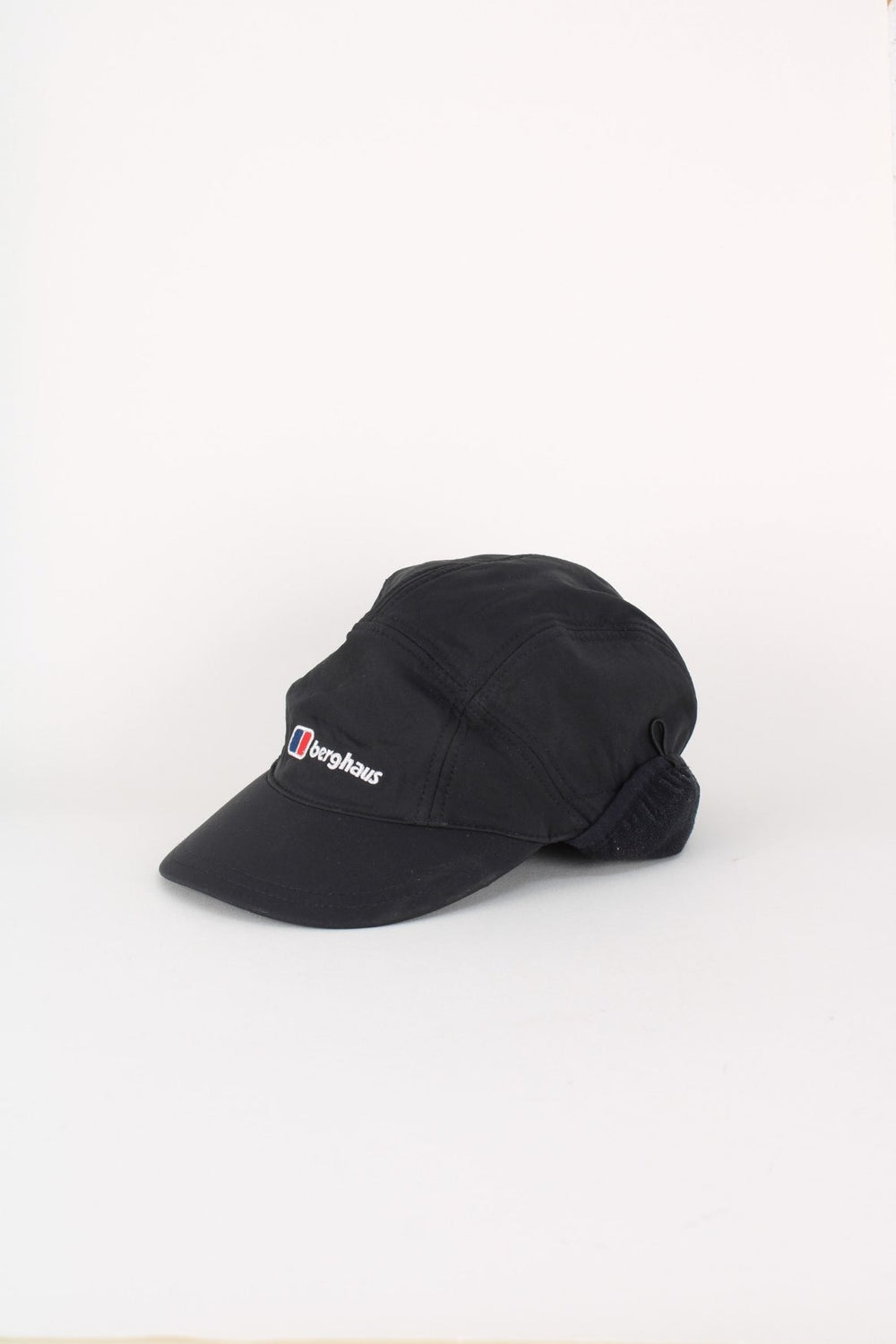 Berghaus Windstopper Cap in a black colourway with the logo embroidered on the front, and windstopper panel on the sides and back.