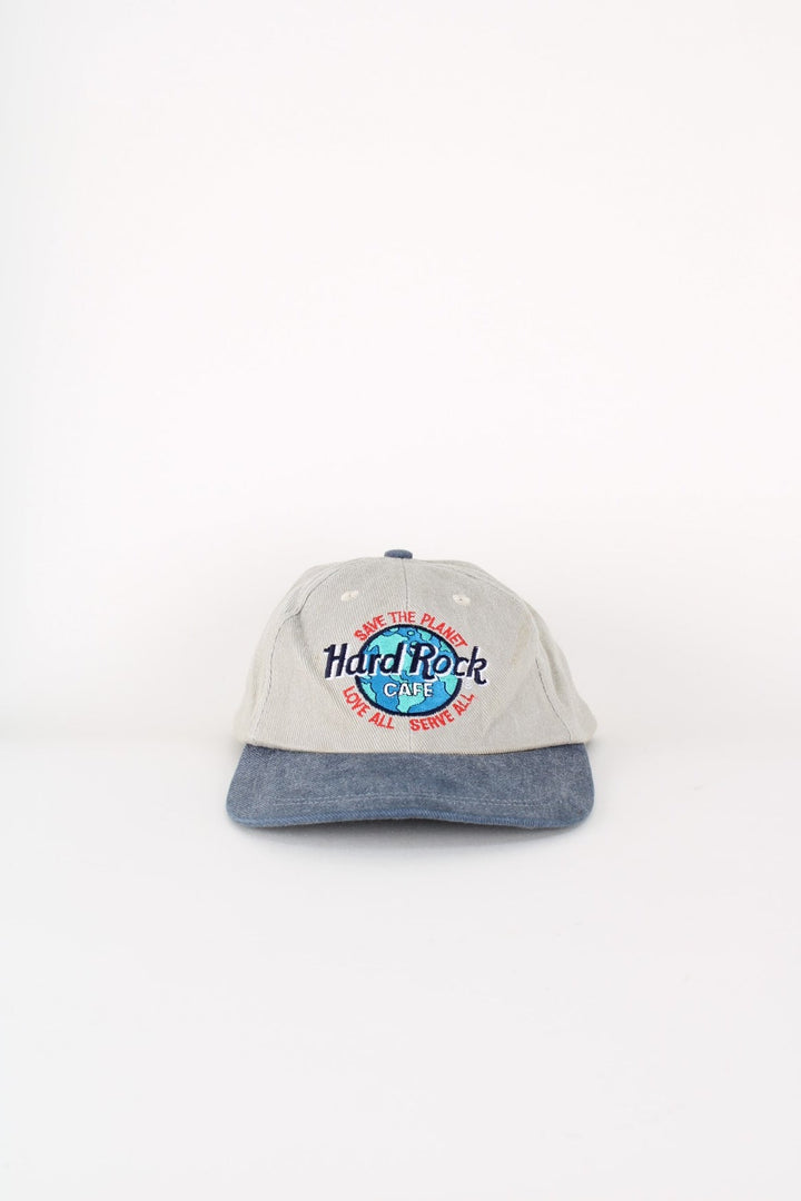 Vintage Hard Rock Cafe New York Cap in a grey and blue colourway with the logo embroidered on the front and New York spell out on the back, and has adjustable snapback.