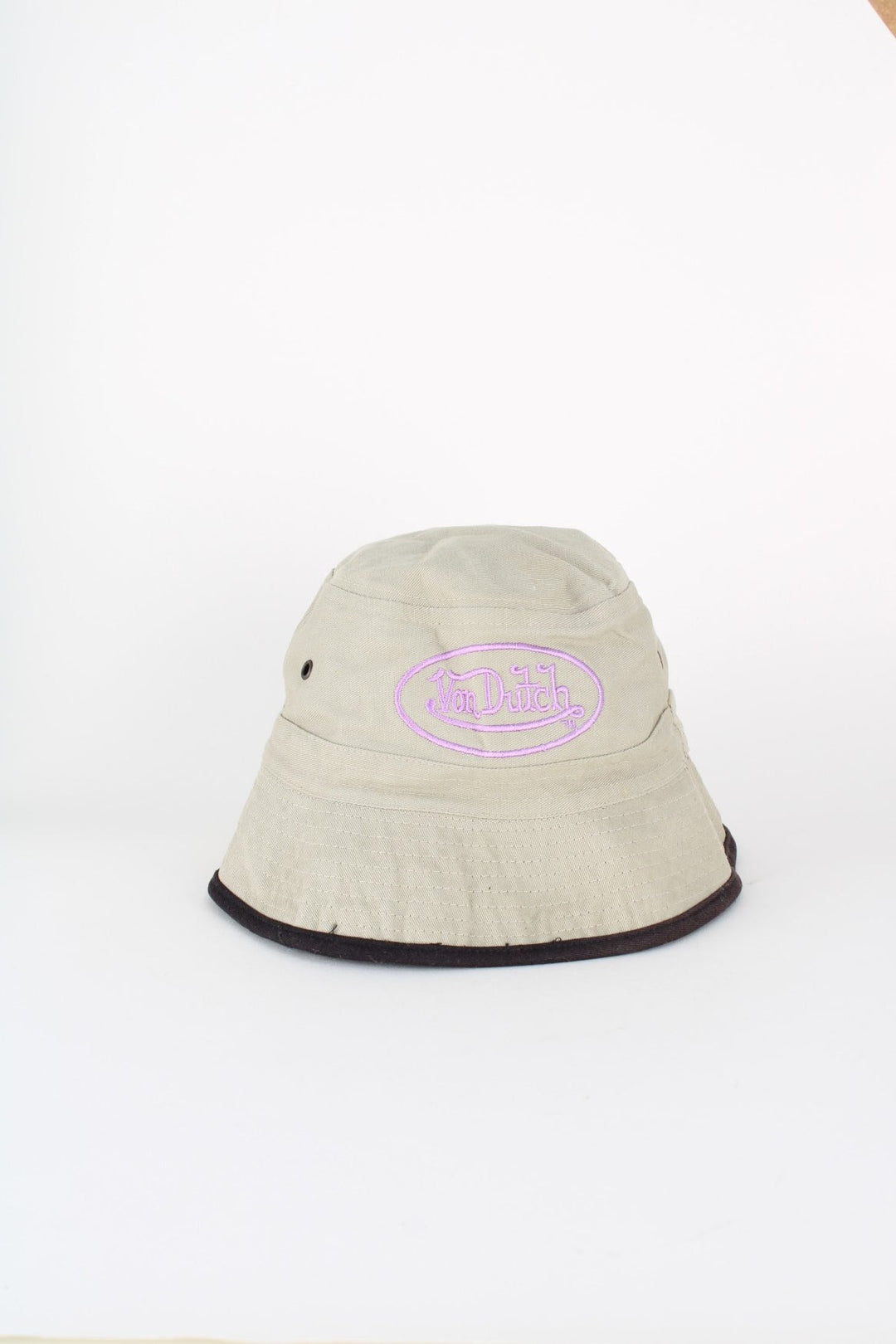 Y2K Von Dutch Reversible Bucket Hat in either a black or beige colourway options, and has the logo embroidered on.