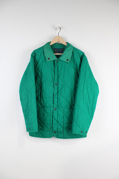 Vintage 90's Fila "Magic Line" green quilted jacket. Closes with popper buttons.   good condition- some faint marks on the sleeve (see photos)  Size in Label:  Mens M