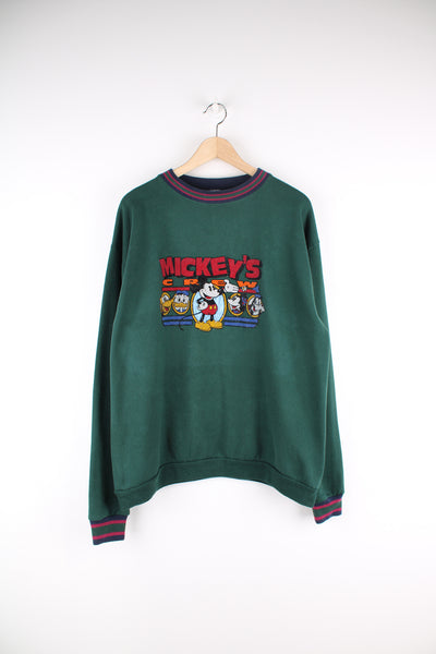 Vintage Disney Mickey Mouse's Crew Sweatshirt in a green colourway, and has a big graphic print across the front.
