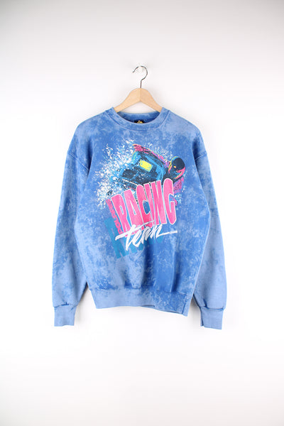 Vintage Polaris Racing Team Graphic Sweatshirt in a blue colourway, tie dye style, and has a big puff print snowmobile race graphic printed on the front.