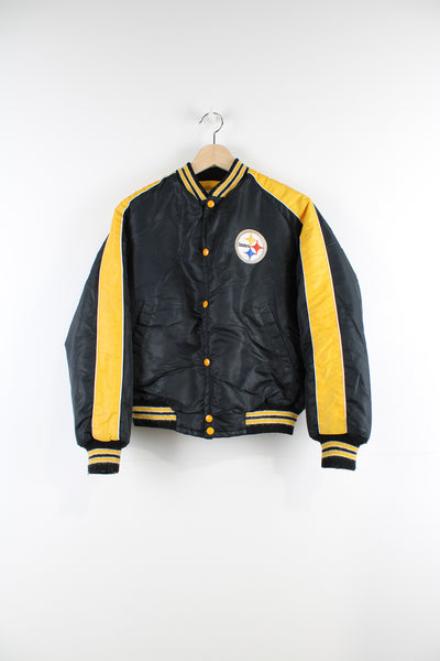 Vintage NFL Pittsburgh Steelers satin varsity jacket with embroidered badges.  good condition - bobbling on the cuffs and one very small hole on the front of the jacket (see photos)  Size in Label:  Womens 18 - Measures like a UK 8 (S)  Our Measurements:  Chest: 20 inches Length: 22 inches