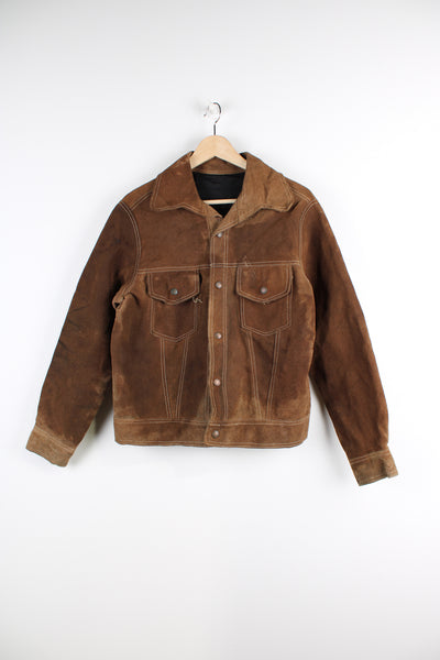 Vintage Western suede leather jacket in brown, button up with a camp collar, two pockets on the chest and contrast stitching throughout.