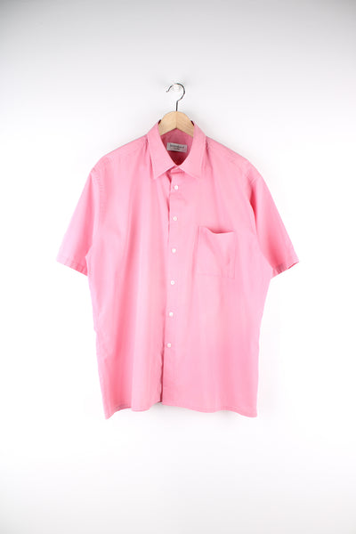 Vintage YSL short sleeve shirt in pink with chest pocket, features embroidered logo on the pocket