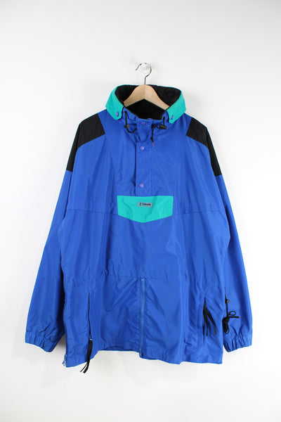 Vintage Columbia blue 1/4 button fastening waterproof jacket with embroidered logo on the chest