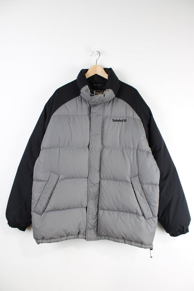 Timberland grey and black puffer jacket features embroidered logo on the chest 