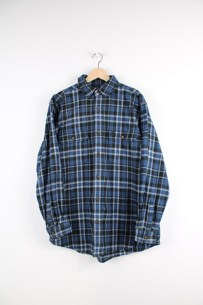 Carhartt blue check flannel button up shirt with long sleeves and branded logo on the chest pocket.  good condition  Size in Label:  Mens L 