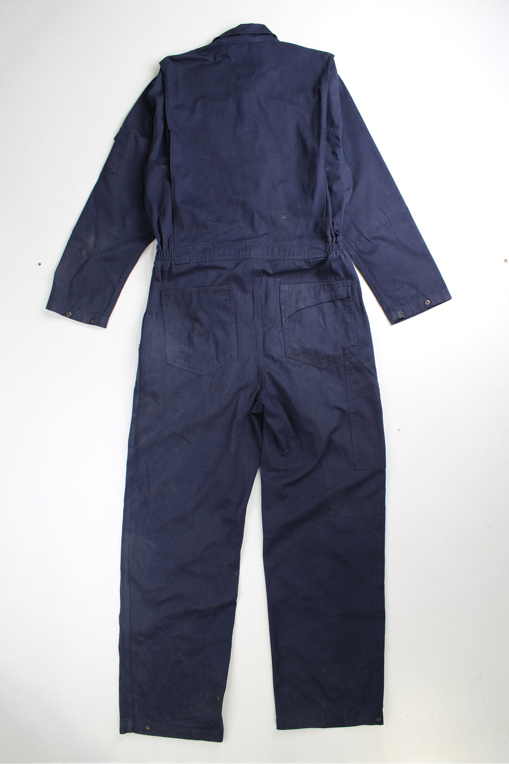 Red Wing full length cotton jumpsuit in navy blue with embroidered logo on the waistband. Waistband is elasticated at the back and closes . good condition- some marks on the legs (see images) Size in Label: UK Mens 42 (L)