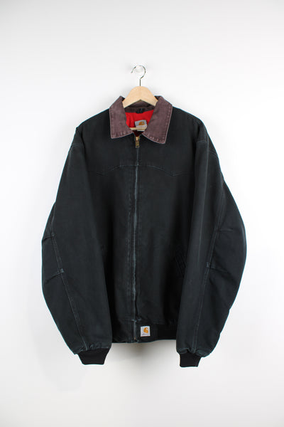 Vintage 00's black Carhartt  Santa Fe Jacket with western style yoke and red quilted lining. Has elasticated cuffs and hem.   good condition   Size in Label:    Label faded - Measures like a Mens XXL