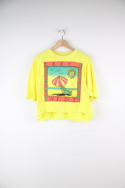 Vintage 90's 'Key West' beach scene graphic cropped t-shirt in yellow, with single stitching by Surf Style brand