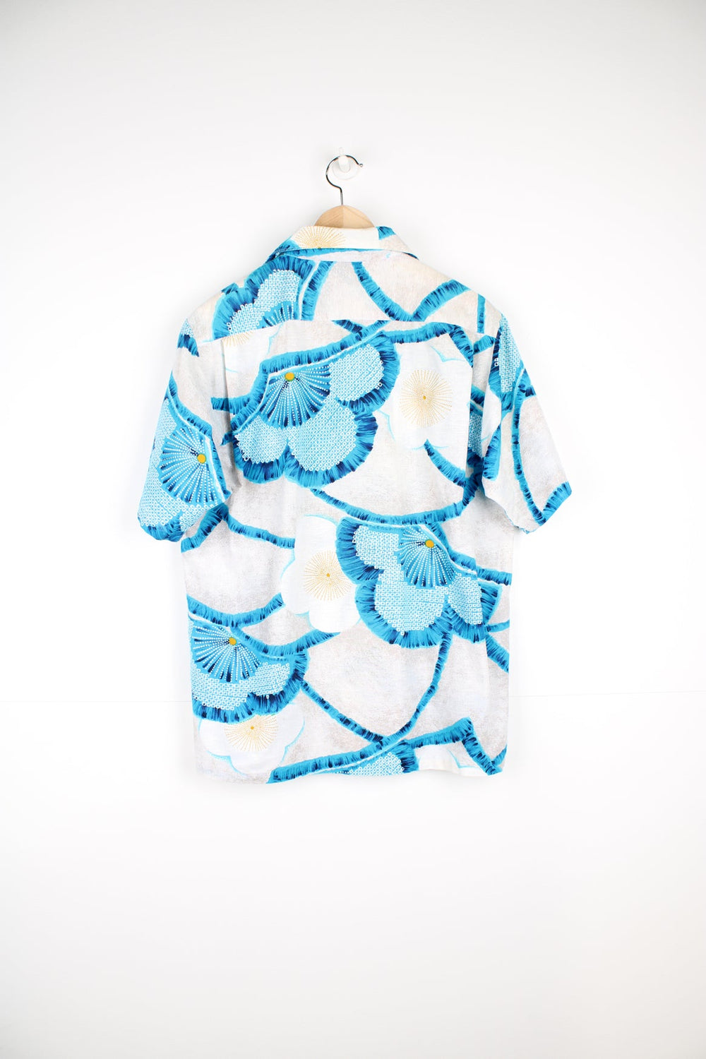 Vintage Mr.Kailua Hawaiian Shirt with blue flower print and chest pocket.