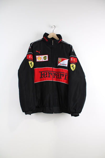 All black Ferrari themed zip through bomber jacket, features embroidered sponsor badges through out, made from polyester 