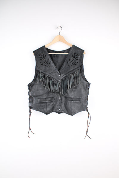 Vintage 90's black leather waistcoat with suede rose inlay design and fringe. The waistcoat features lace up detail at the sides and popper buttons to close at the front.  fair condition - some small flecks of paint/ small punctures from a badge thats been removed on the chest and two of the popper buttons at the front are missing (the second one down and the last one)  Size in Label:  Mens L