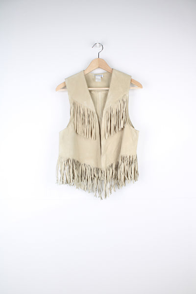 Vintage 70's light beige fringe suede vest. Has fringe along the front, bottom and back. No fastenings, intended to be worn open.  Good condition - Some light discoloration (see photos)  Size in Label:  Womens L (measures more like a M)