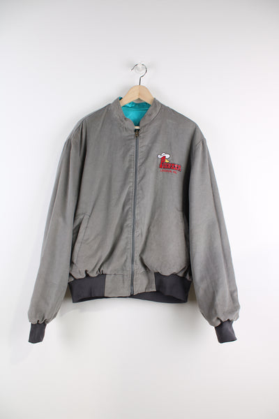 Vintage Corduroy Reversible Bomber Jacket in a grey colourway as well as a blue nylon reversible option, zip up, multiple pockets, and has embroidered 'Pioneer' logo on the chest.