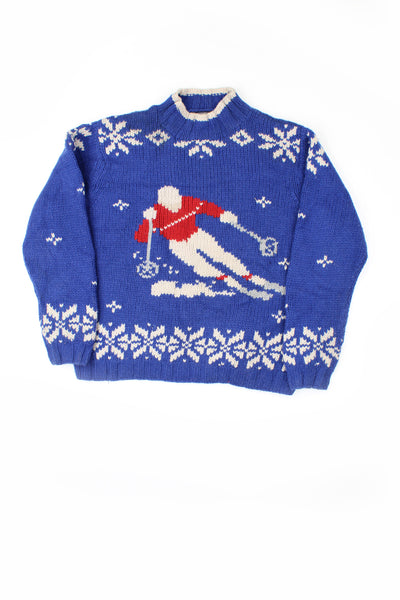 Vintage blue hand knit jumper. Navy blue with ski motif throughout.   good condition - some light bobbling  Size in Label:  L