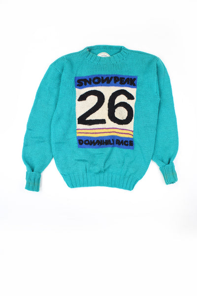 Vintage blue California wool knit jumper with "Snowpeak 26" motif on the front.   good condition - some slight discoloration on the neck but nothing of note.   Size in Label:  S - Measures more like a M 