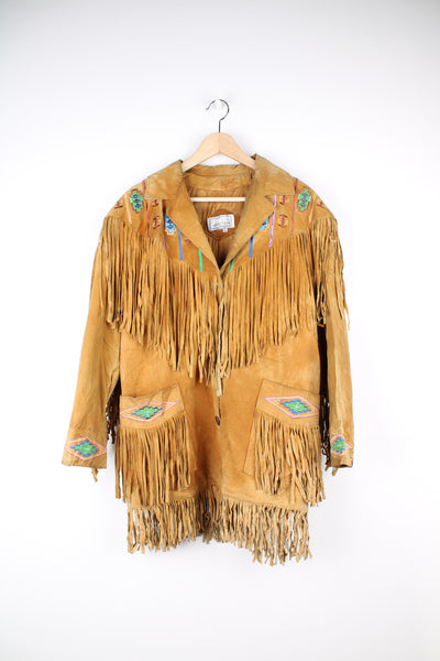 Vintage 80's Erez Levy tan suede jacket. The jacket features embroidery and beaded detail through out. good condition - paint on one of the sleeves fringe and discolouration in places (see photos) Size in Label: Mens M 