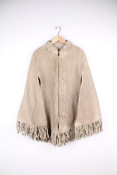 Vintage 1960's vintage suede cape with cut out floral detail down the front and fringe along the hem. Features a good condition - some creases and small sections of discolouration. Size in Label: Size free - Would best fit a womens size M - L