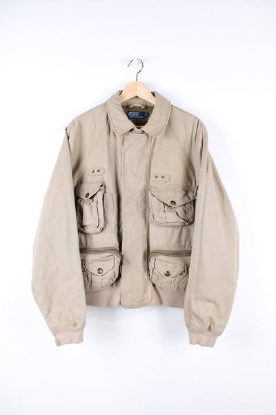 Vintage Ralph Lauren tanned utility jacket, bomber / aviator style, has a quilted lining, zips up and has multiple pockets. 