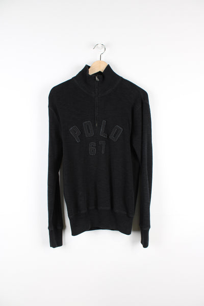 Vintage Polo Ralph Lauren quarter zip sweatshirt in black, has Polo 67 spell out across the front. 