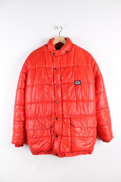 Vintage 1980's orange/red Mountain Equipment Cerro Torre zip through puffer jacket with embroidered logo on chest