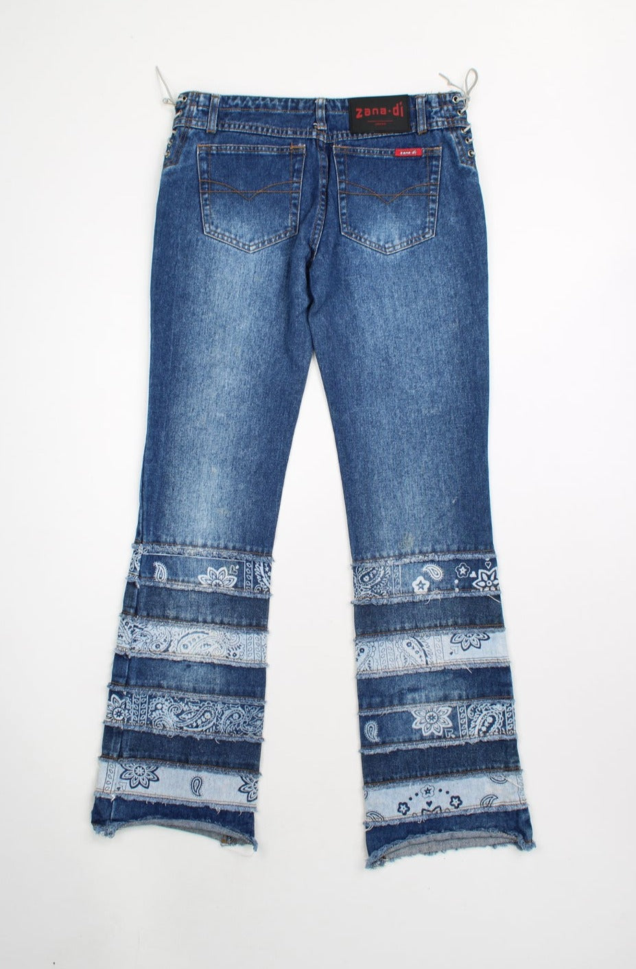 Jeans with embroidery on hot sale bottom