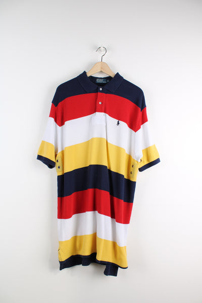 Ralph Lauren Polo Shirt in a blue, red, white and yellow striped colourway, 1/4 button up and has the logo embroidered on the chest.
