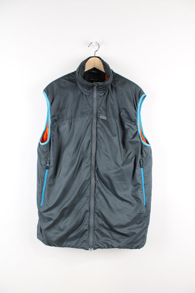 Paramo Torres Medio all grey lightly padded, insulated outdoor gilet. Features zip up pockets