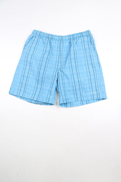 Blue Reebok checked shorts with elasticated waist and drawstring. Features embroidered logo on the leg