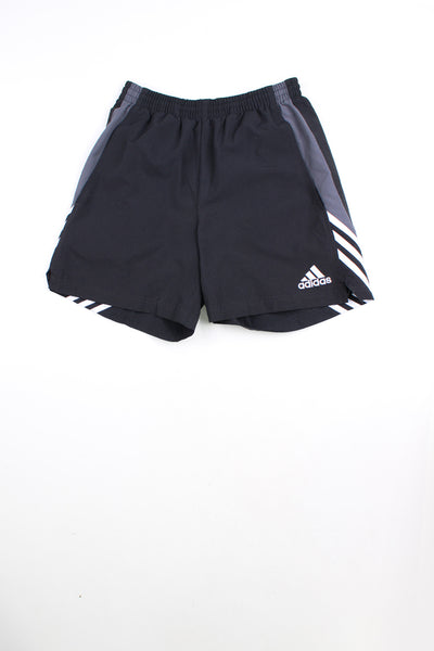 00's black Adidas sports shorts with elasticated waist and drawstring tie. Features three stripe detail down the side of the leg and embroidered logo on the front.
