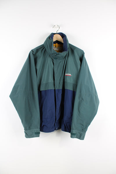 Vintage green and blue Nautica competition zip through bomber jacket, features embroidered spell-out logo across the chest and foldaway hood