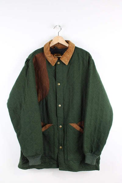 Vintage Woolrich Classics wool blend hunting jacket in green, button up with a brown corduroy collar, big pockets and has a quilted lining. 