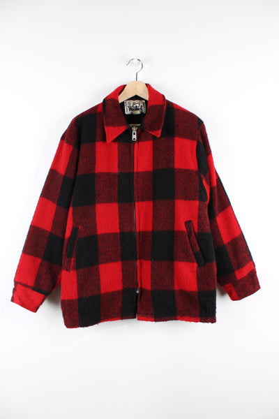 Vintage Woolrich red & black plaid wool CPO jacket, zip up with side pockets and fleece lining.