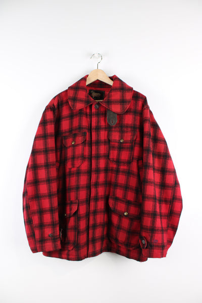 Vintage 1970's Woolrich red & black plaid wool button up CPO jacket with multiple pockets.