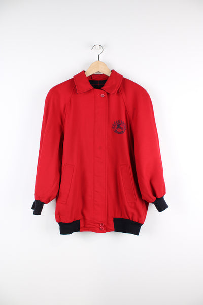 Vintage Burberry Harrington jacket in red, zip up, has two side pockets, tartan lining, cropped arm length and logo embroidered on the chest. 