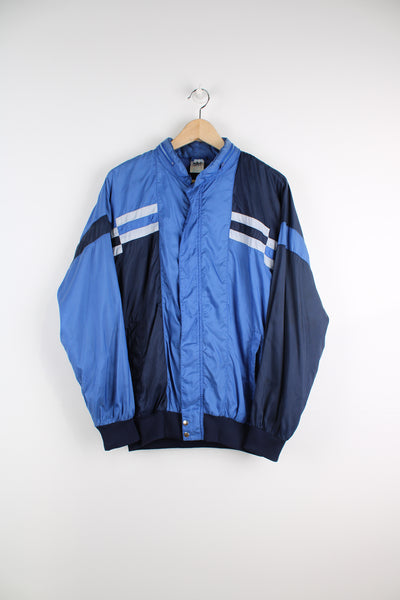 90's Adidas blue colour block zip through track jacket, features embroidered logo on the chest, foldaway hood and zip up pockets