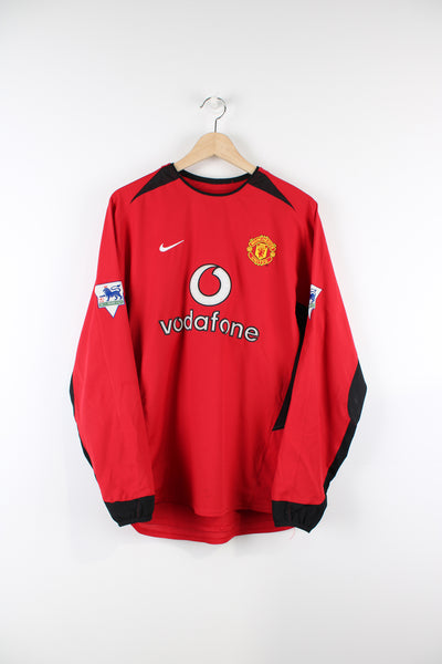 Manchester United Nike 2003/04 home football shirt with Van Nistelrooy number 10 on the back, has embroidered logos on the front and Premier League badge on the sleeve. 