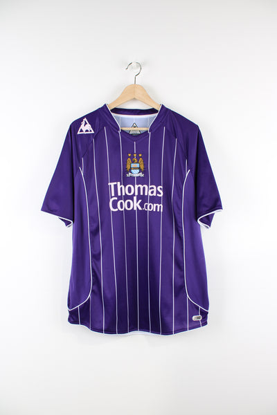 Manchester City 2007/08 Le Coq Sportif away football shirt, Ellano number 11 kit, purple and white colourway with embroidered logos on the front.