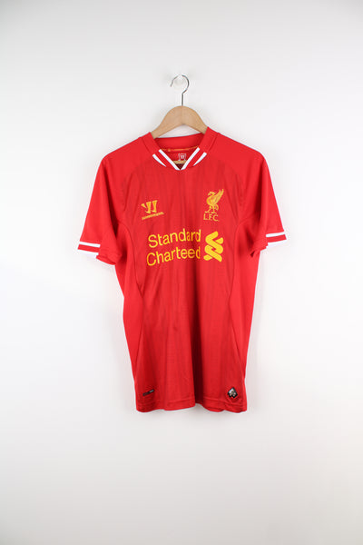 Vintage Liverpool 2013/14 Football Shirt in a red, white and yellow team colourway, Steven Gerrard number 8 printed on the back, V-neck, and has logos printed on the front.