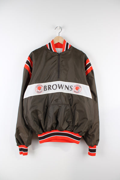 Vintage Cleveland Browns NFL pullover jacket, brown, white and orange team colourway, half zip up, front pocket, and has Browns spell-out and logo across the front. 