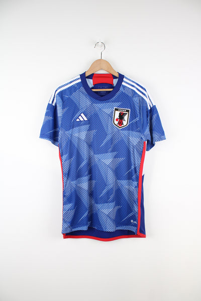 Japan 2022/23, Adidas Football Kit in a blue and white patterned colourway, and has logos embroidered on the front.