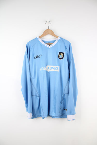 Manchester City 2003/04, Reebok Long Sleeved Football Kit in a blue colourway, and has logos embroidered on the front.